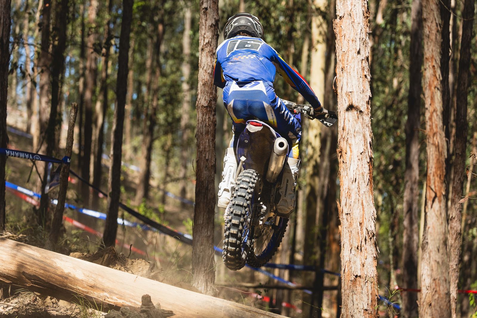 Deegan Graham jumping a log